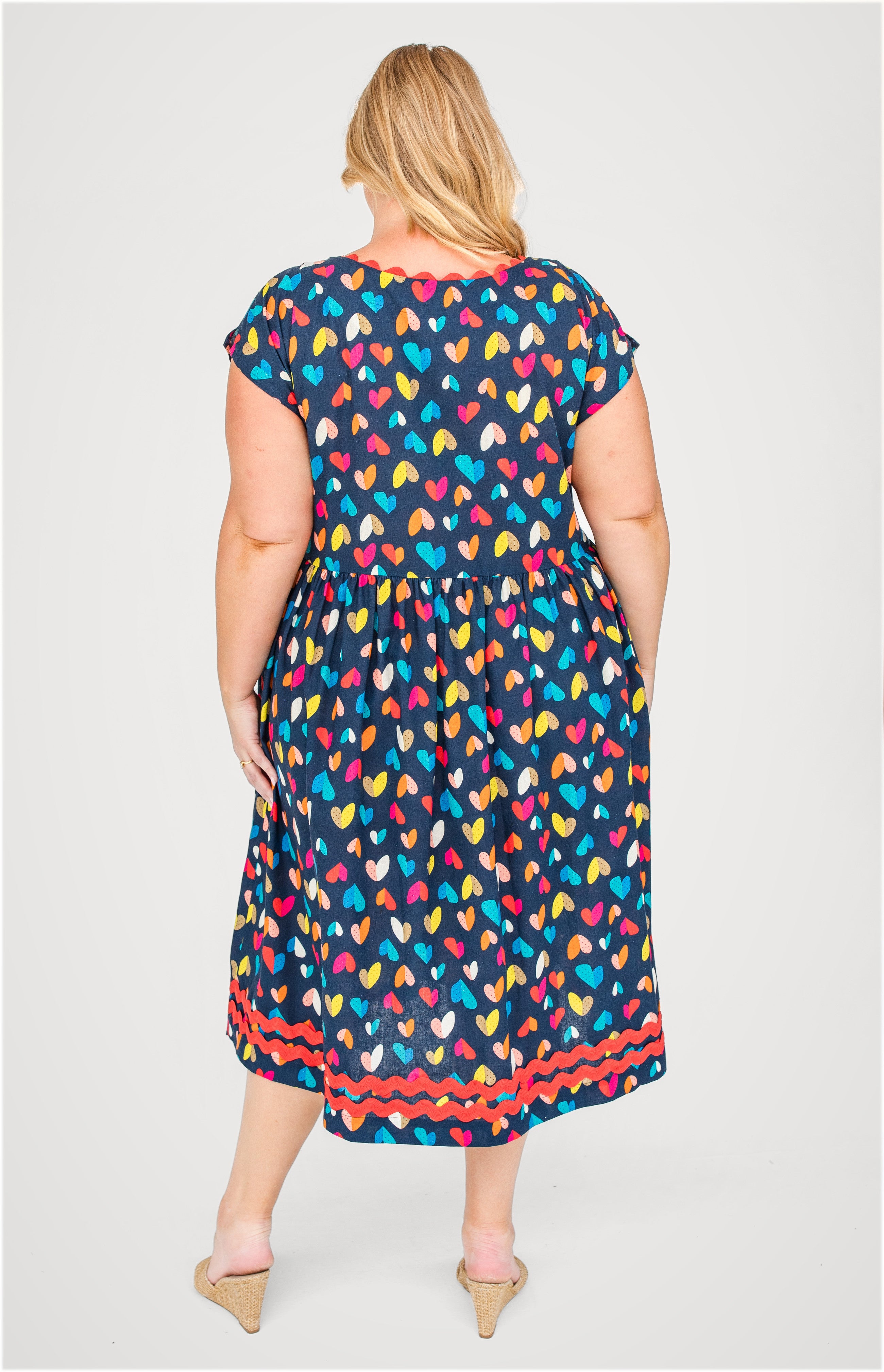 Holiday Dress in rainbow hearts