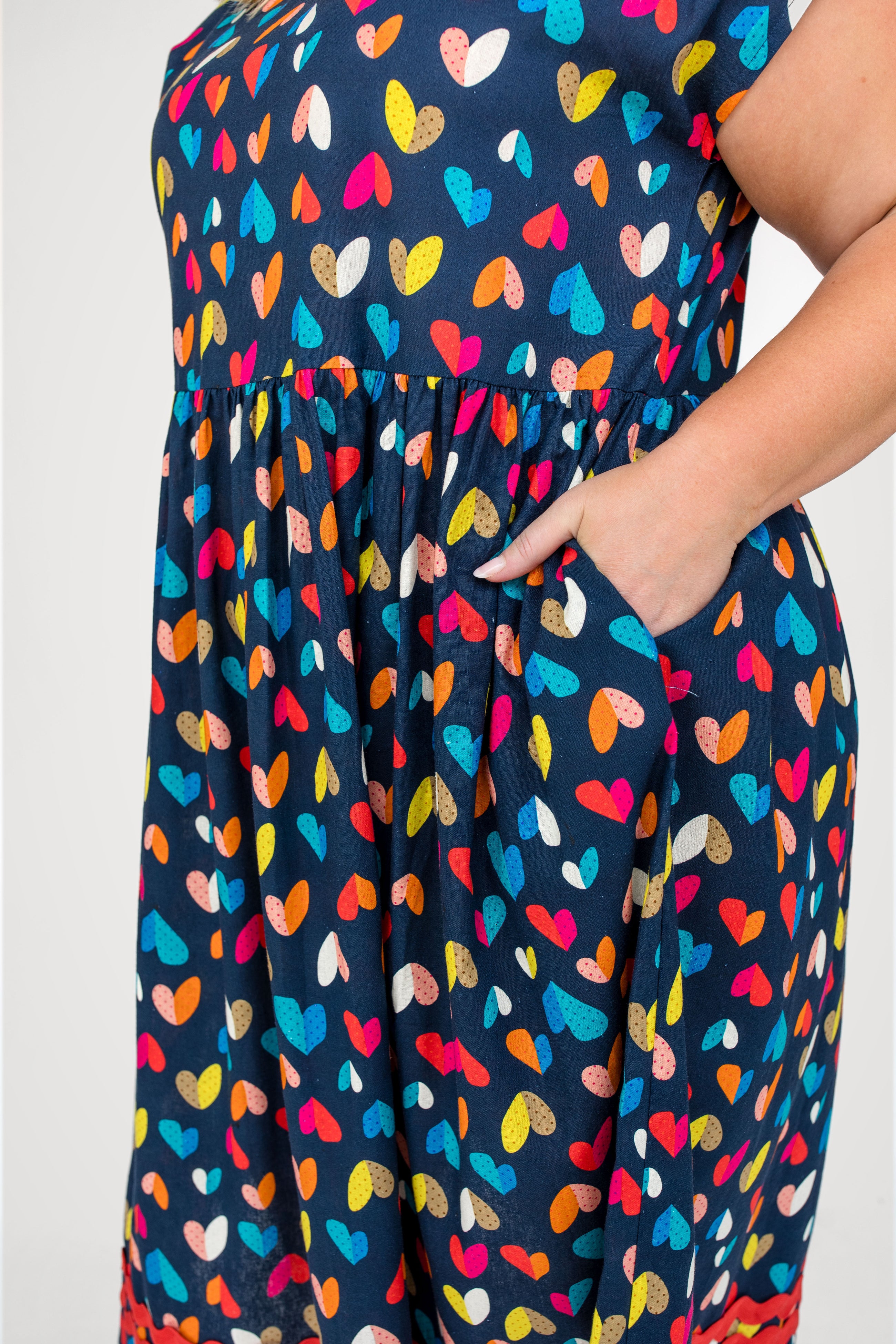 Holiday Dress in rainbow hearts