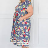 Holiday Dress in peach blossoms