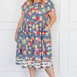 Holiday Dress in peach blossoms