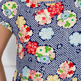 Holiday Dress in peach blossoms