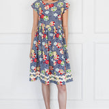 Holiday Dress in peach blossoms