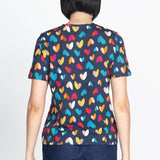 Holiday Tee in rainbow hearts