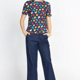 Holiday Tee in rainbow hearts