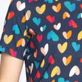 Holiday Tee in rainbow hearts