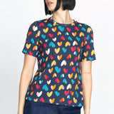 Holiday Tee in rainbow hearts