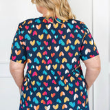 Holiday Tee V Neck in rainbow hearts