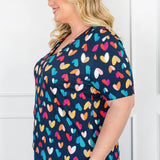 Holiday Tee V Neck in rainbow hearts