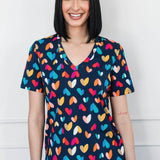 Holiday Tee V Neck in rainbow hearts