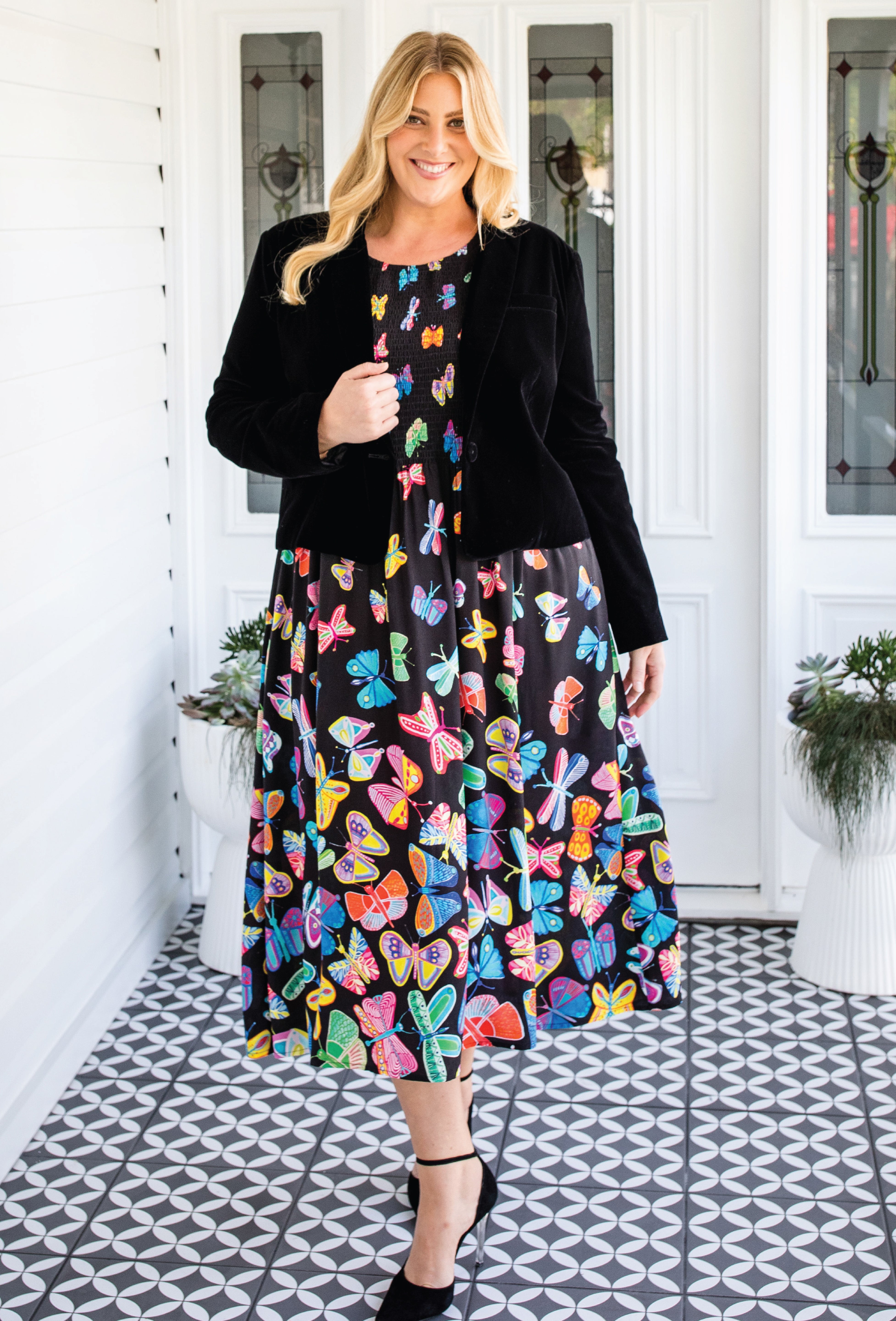Model wearing Perfect Velvet Blazer in black – nipped waist and slim sleeves
