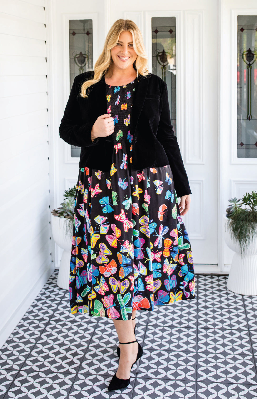 Model wearing Perfect Velvet Blazer in black – nipped waist and slim sleeves