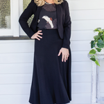Designer wearing luxe black Bamboo Must Have Skirt - flattering stretch fabric