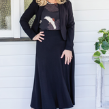 Designer wearing luxe black Bamboo Must Have Skirt - flattering stretch fabric