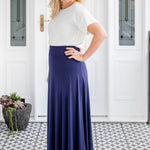 Back view of navy bamboo skirt – smooth drape over hips with slim waistband