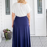 Back view of navy bamboo skirt – smooth drape over hips with slim waistband