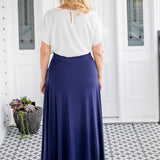 Back view of navy bamboo skirt – smooth drape over hips with slim waistband