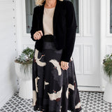 Model wearing Bamboo Must‑Have Skirt in Poetry in Motion black – flattering drape and stretch ponte waistband