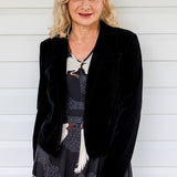 Black velvet jacket by Maiocchi – statement layer for day-to-night styling