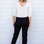 Back view of black Perfect Ponte Pant – clean line and straight-leg fall for elongating effect