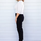 Side view of black Perfect Ponte Pant – clean line and straight-leg fall for elongating effect