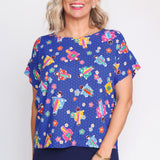 Poppy Top in charmed i'm sure