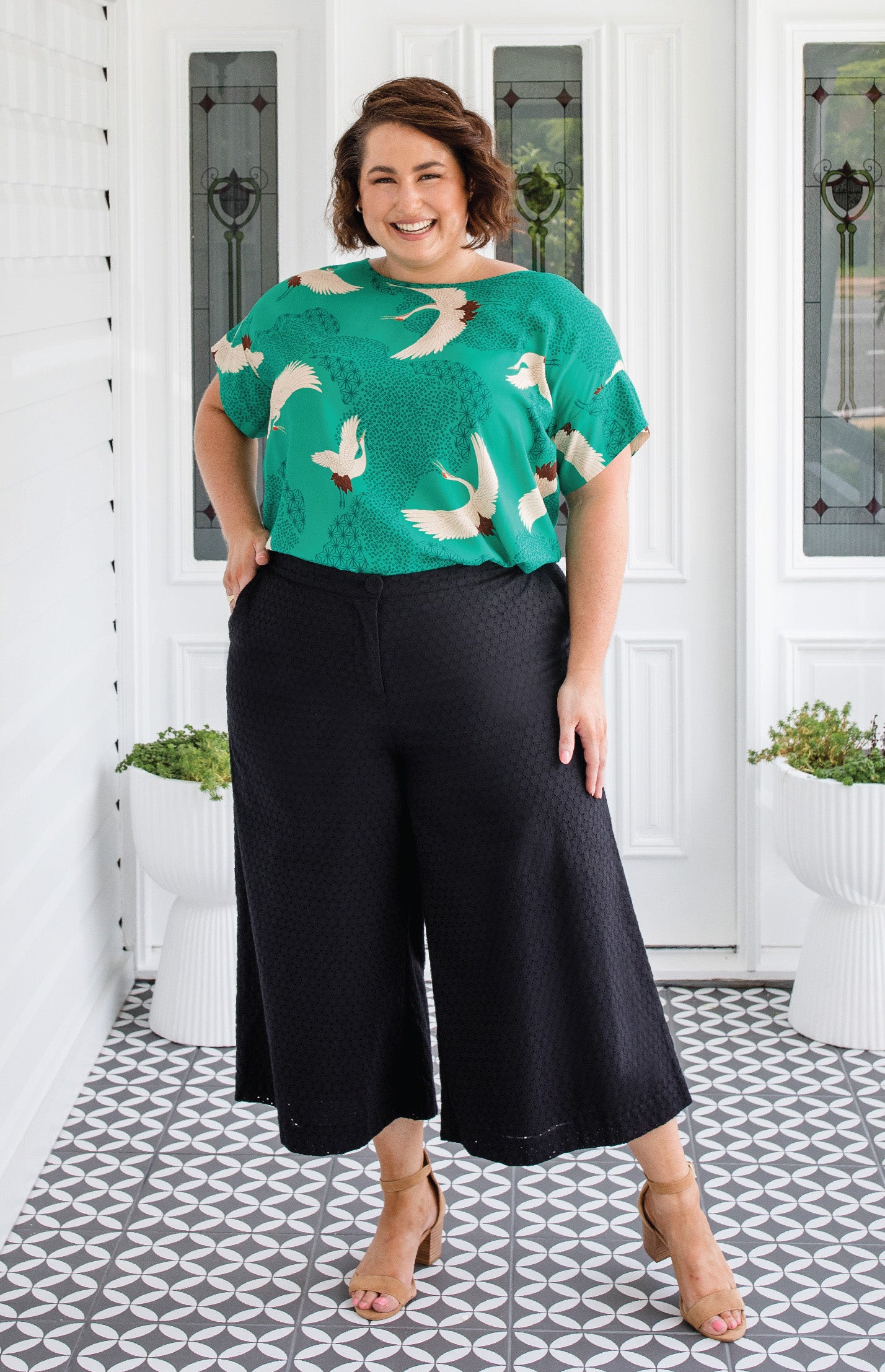Model wearing Poppy Top in Poetry in Motion green - relaxed fit slip-on top with soft rayon