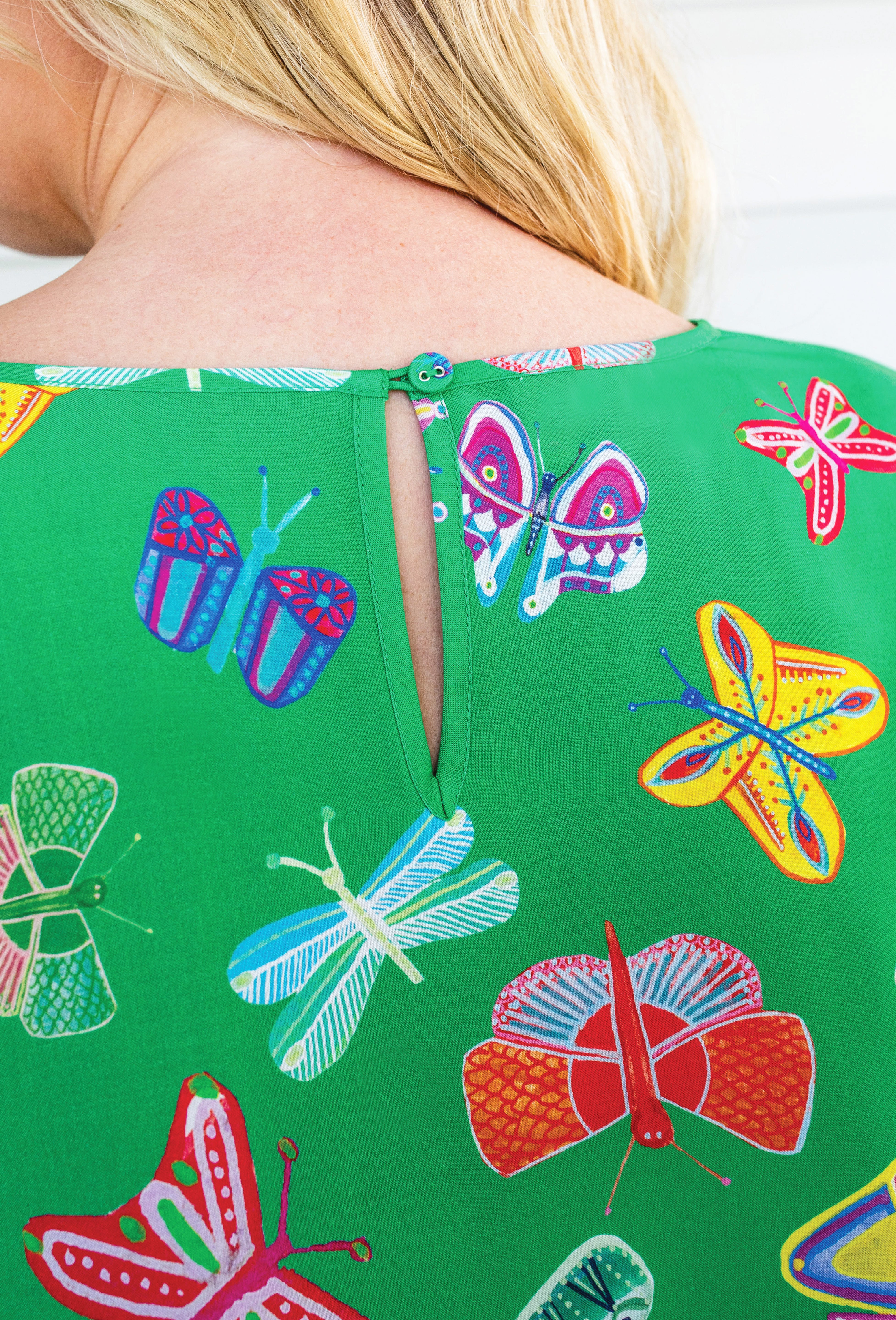 Maiocchi Social Butterfly Green Poppy Top, perfect for layering