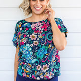 Truly Madly print - vibrant peacock feathers on navy background
