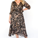 Victoria Dress in black diamond - a wrap-style frock with long sleeves and a separate slip dress. 