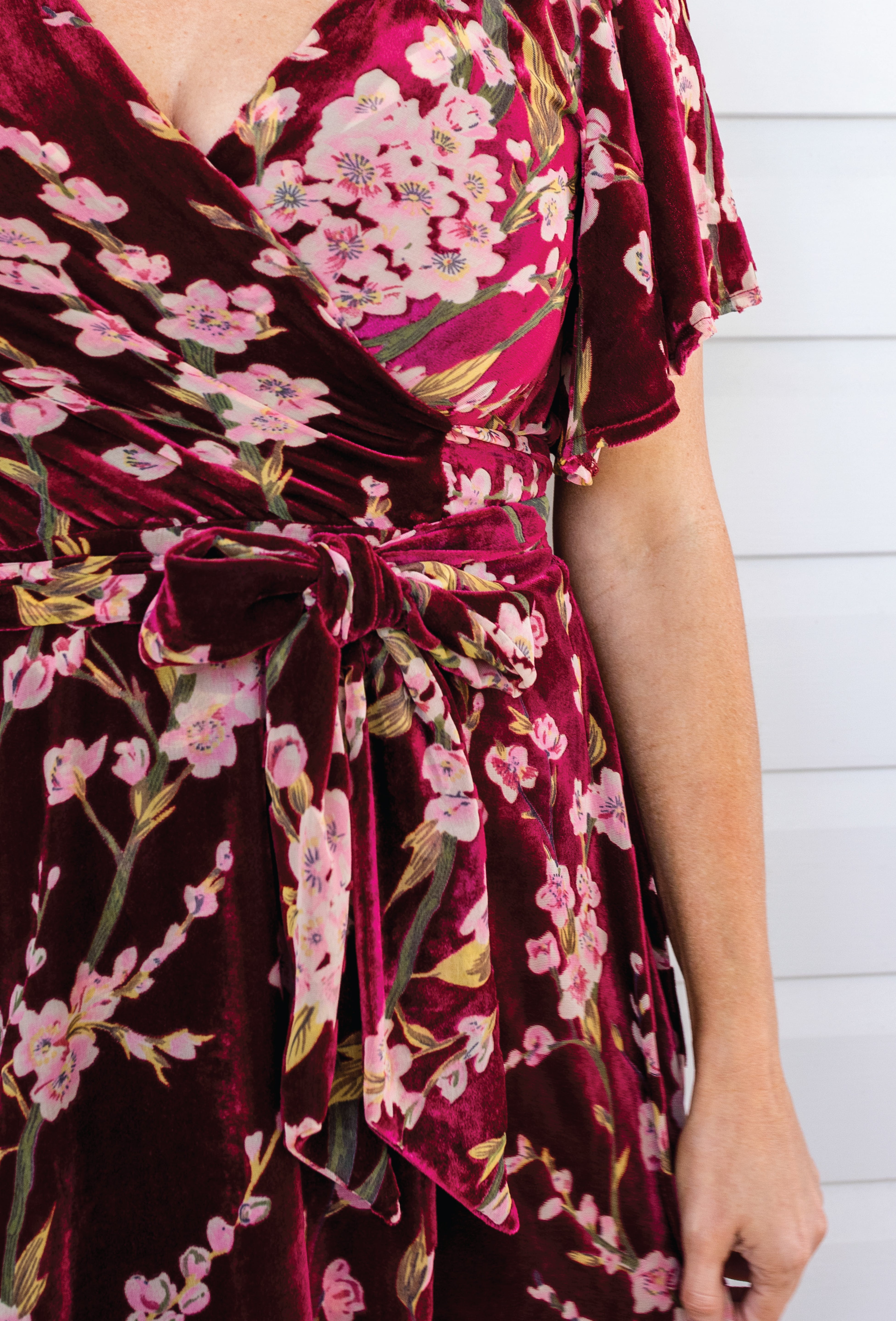 Rich blossom wine velvet detail on the Violet Dress – texture close‑up