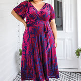 Maiocchi Violet dress in cornflower blue velvet – elegant wrap-style evening dress