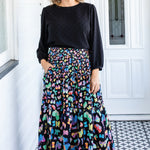 Classic black Violet Top by Maiocchi featuring a spot texture