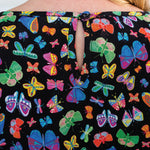 Maiocchi Colourful Violet Top in black butterfly print.