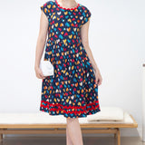 Holiday Dress in rainbow hearts