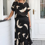 Thick stretch ponte waistband on printed skirt – secure and comfy fit in Poetry in Motion black