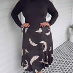 Poetry in Motion kimono print on bamboo skirt, black background – soft textured fabric