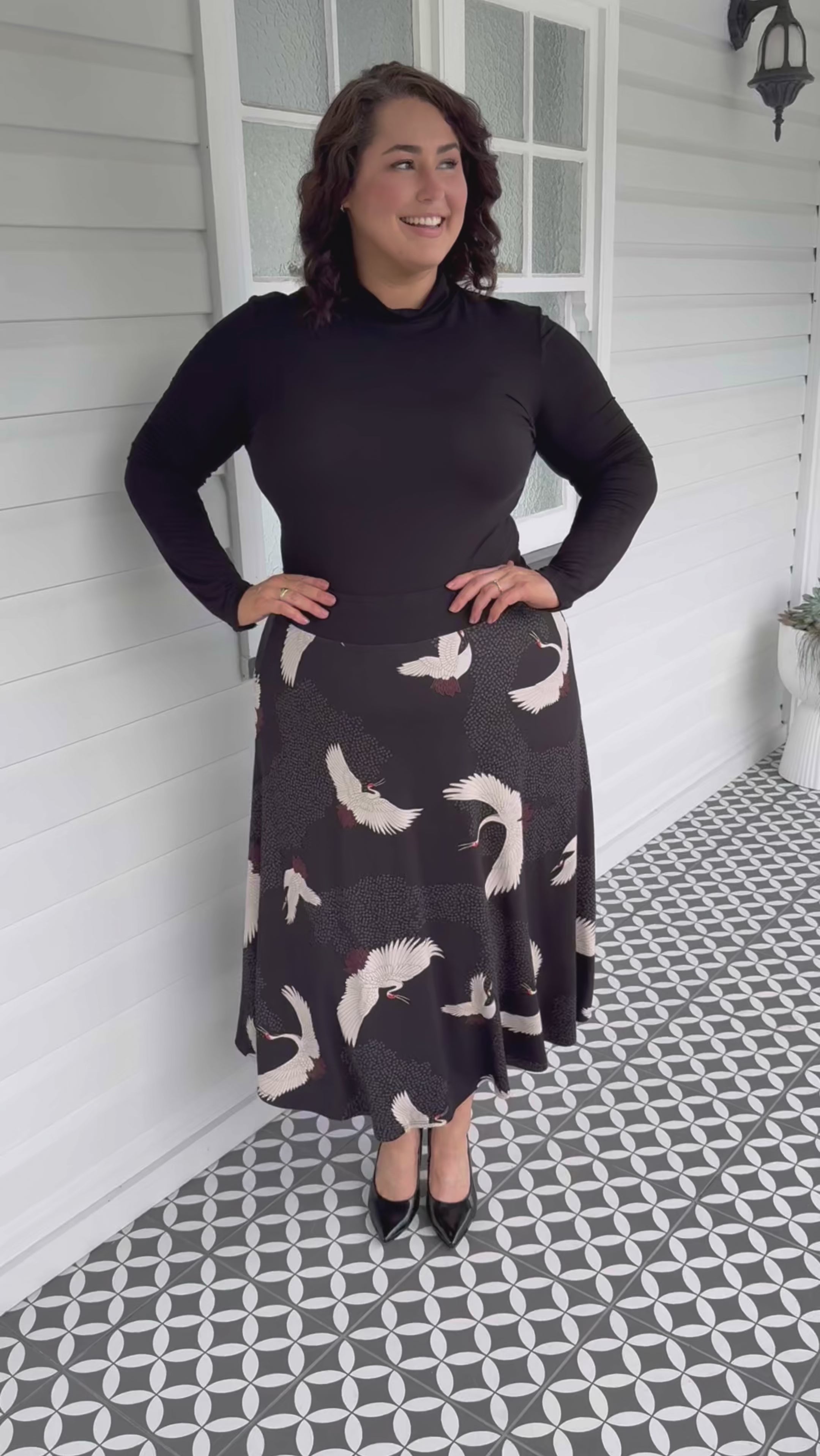 Poetry in Motion kimono print on bamboo skirt, black background – soft textured fabric