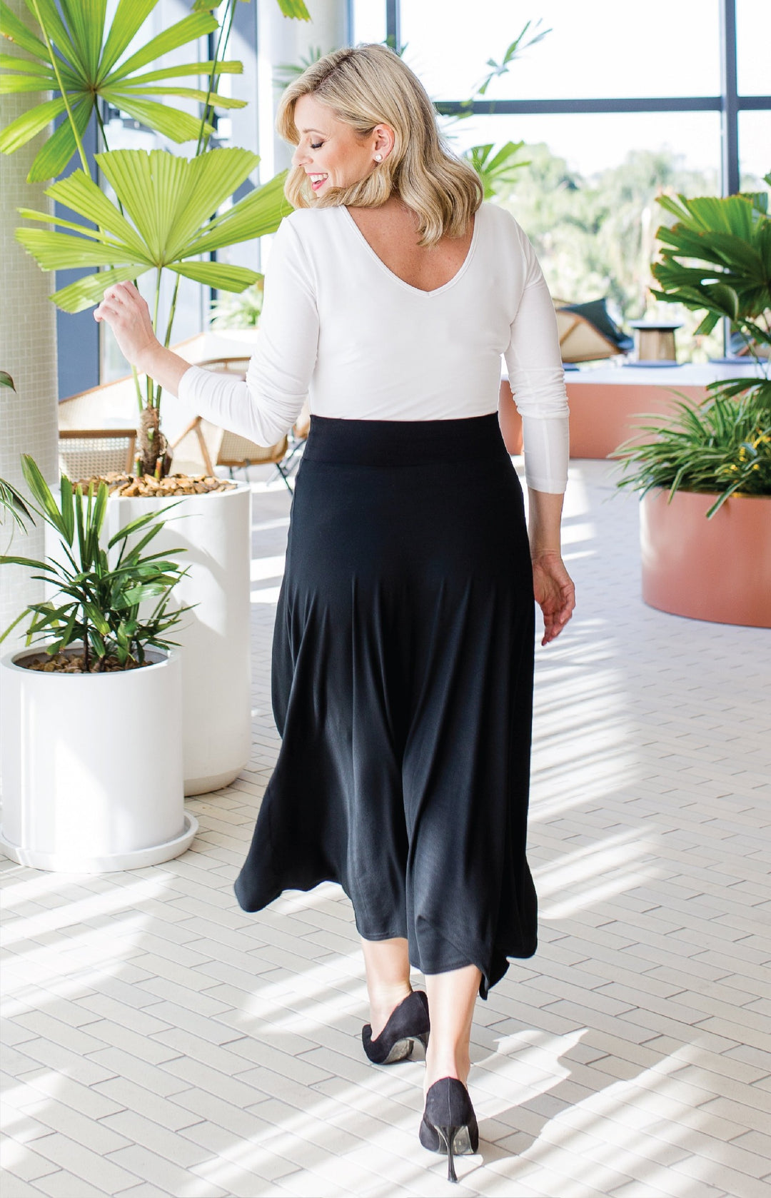 Back view of plain black Must Have Skirt in sustainable bamboo fabric
